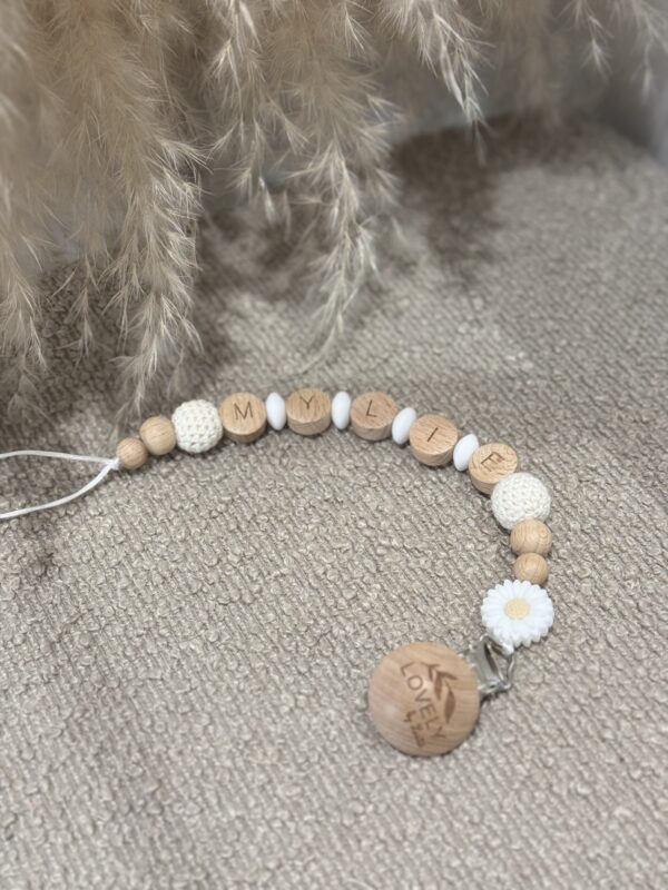 Attache tétine fleurie