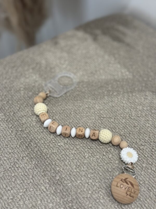 Attache tétine fleurie