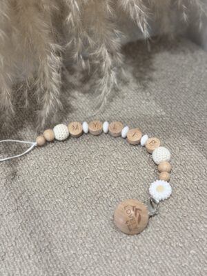 Attache tétine fleurie